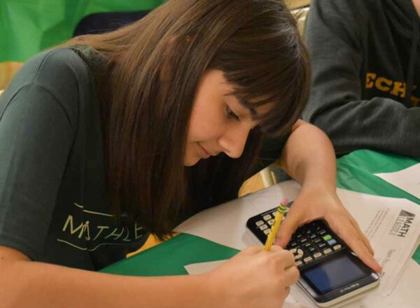 Elisabeth Morrow School student working with pencil and calculator