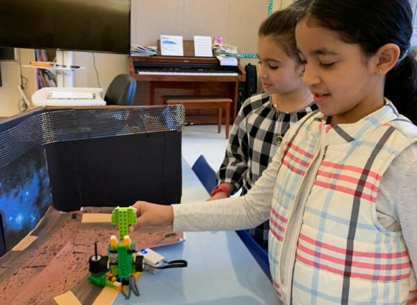 Second graders explore robotics.