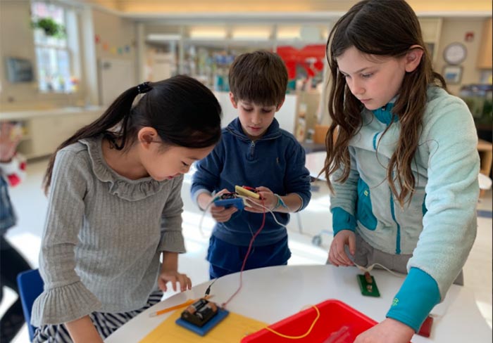 Three Little School Students working on an electricity project in Science and STEAM class at The Elisabeth Morrow School