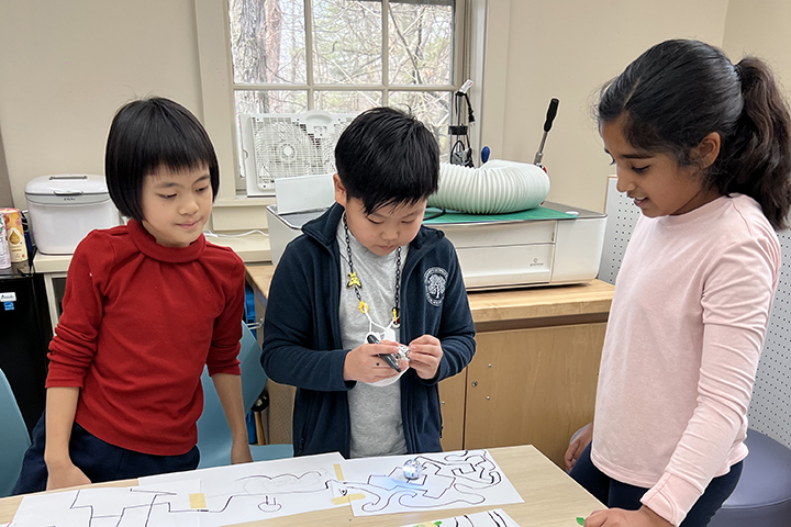students coding with ozobots in computer science class