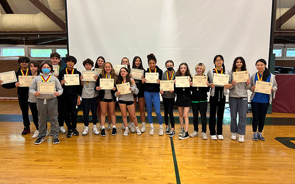 Students posing with honor awards
