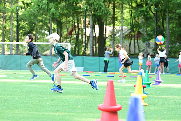 Kids racing on Community Field.