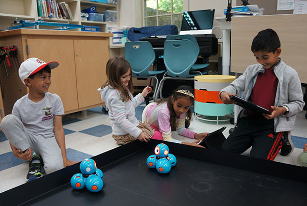 Little School students using Blockly in computer science class