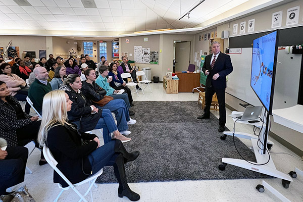 Head of School Marek Beck, Ph.D., speaking to parents and guardians during a Little School Visiting Day.