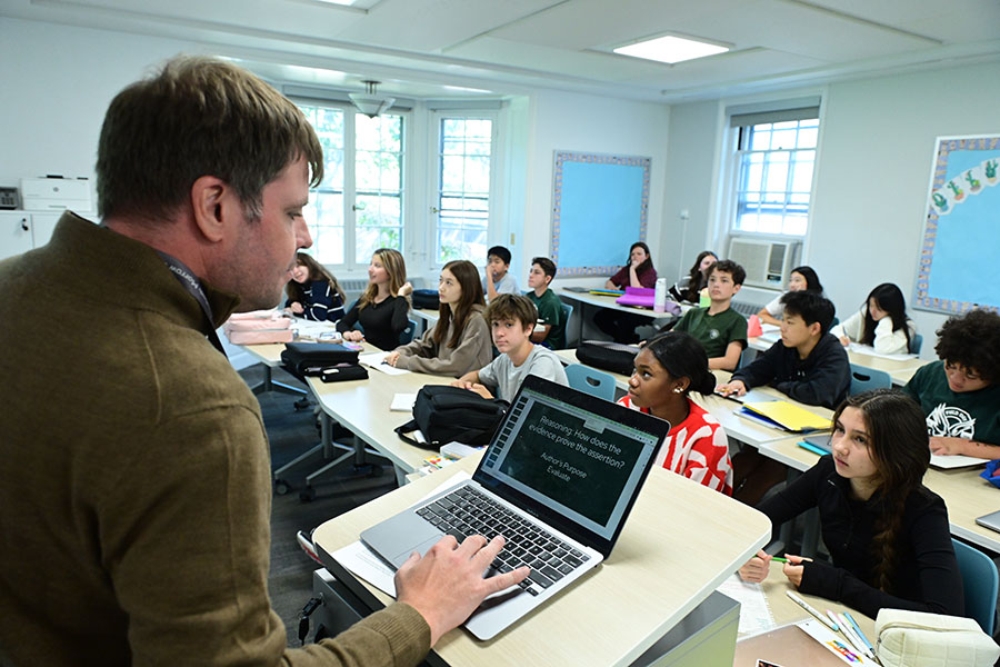 Assistant Head of Middle School teaching one of his classes.