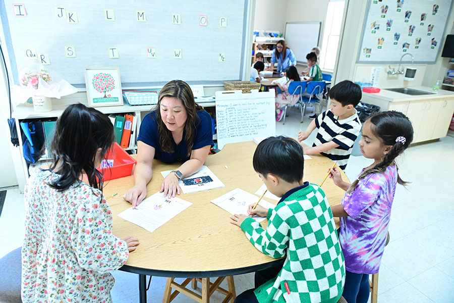 Our lower school students learning in smaller group settings with their teachers.