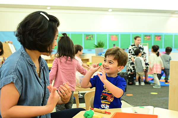 A 3s/4s teacher and a student enjoying learning together